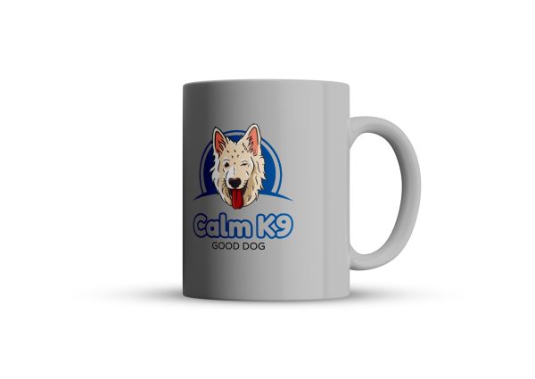 A white mug with the logo of calm k 9.