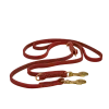 A red leash with gold colored clasps.